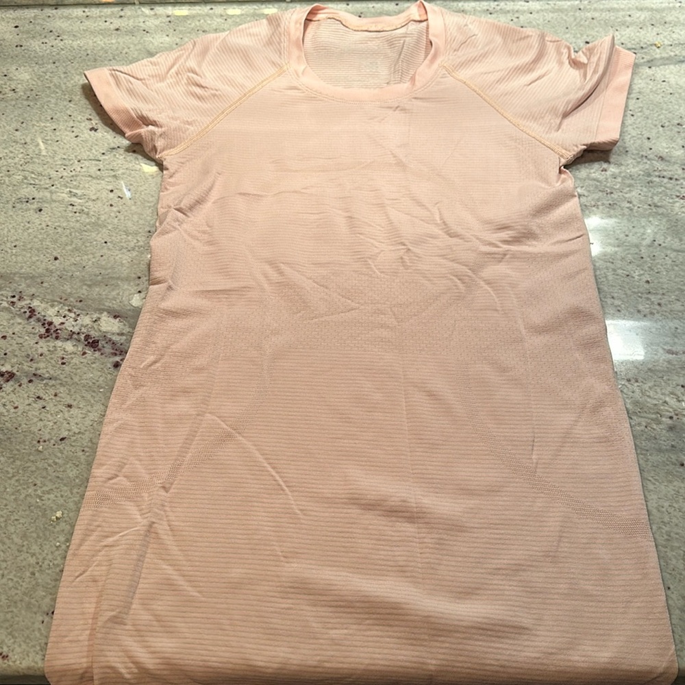 Woman’s lululemon short sleeve top size 4
